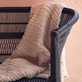Rattan woven cane black Malawi chair with blanket