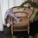 Rattan Kids Malawi chair with throw